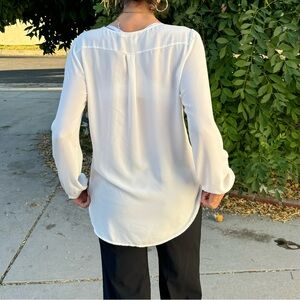 White blouse with long sleeves and button up back #blouse